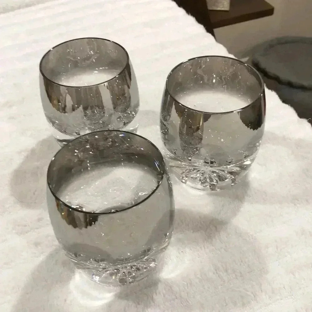 Anthropologie set of three hand blown glasses. 3-1/8” rim and 3-5/8” tall.